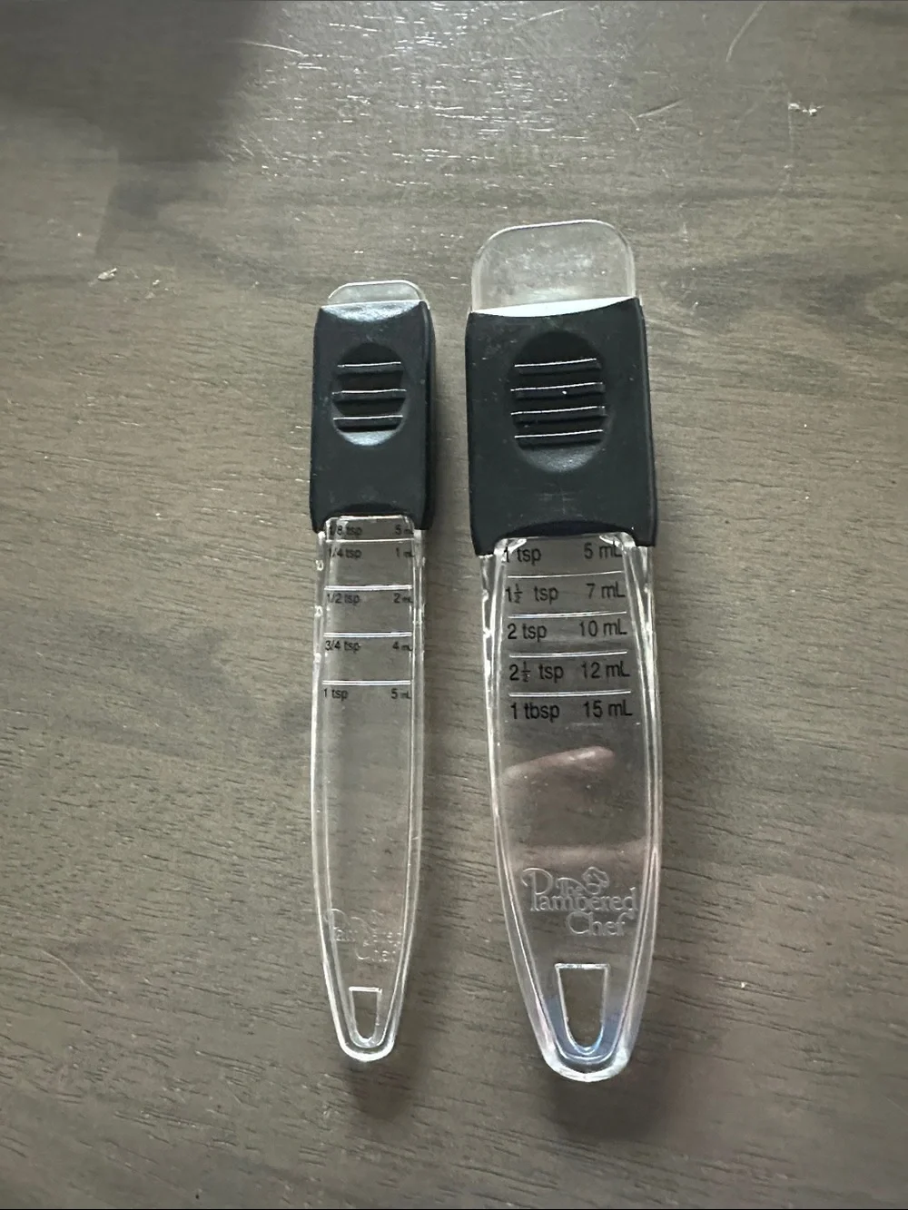 Pampered Chef Clear Adjustable Measuring Spoons, Set of 2 Teaspoon & Tablespoons